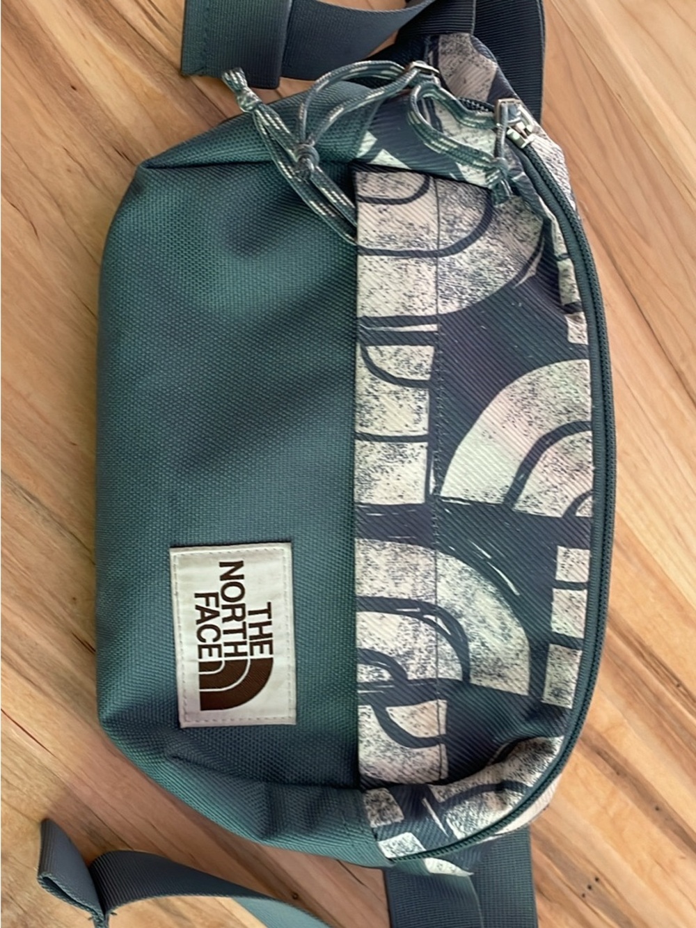 The North Face Blue and Cream Women’s  Belt Sling Bag